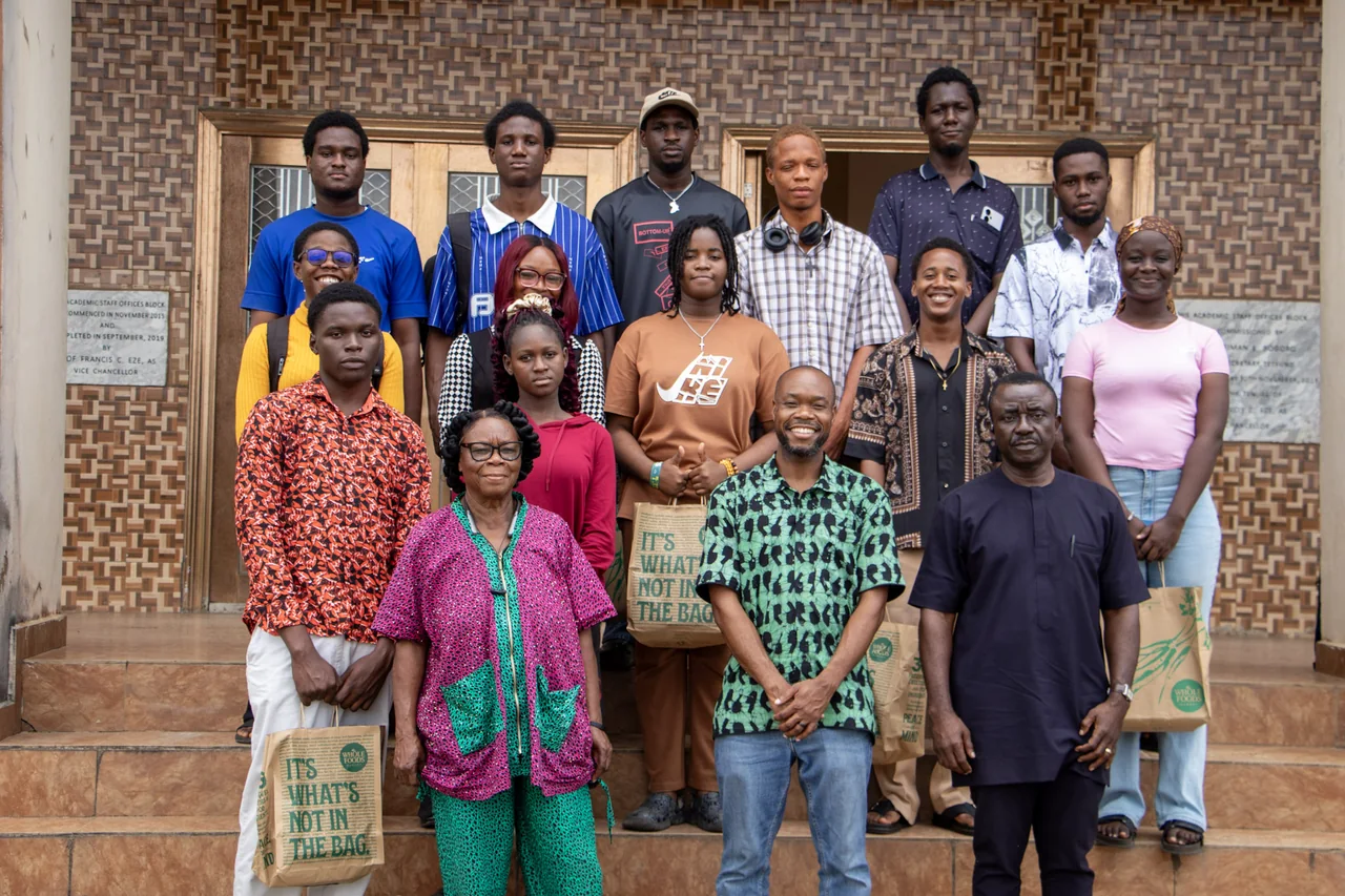 Program members gathered for a group photograph outside a building at FUTO.